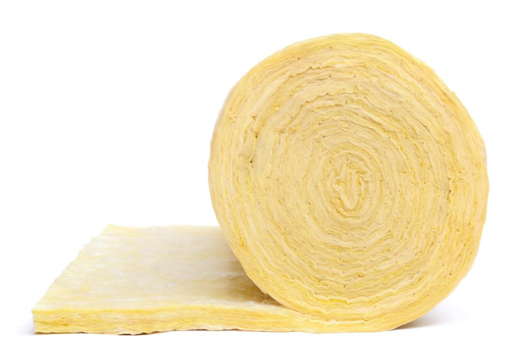 A rolled up fiberglass insulation on a white background