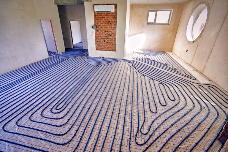 A room with a heated floor installation using wires for heating, How Long Do Heated Floors Take to Heat Up? [By type of floor]