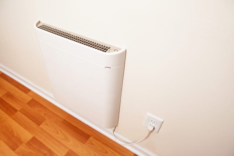An electric convection heater mounted to the wall, Do Convection Heaters Get Hot?