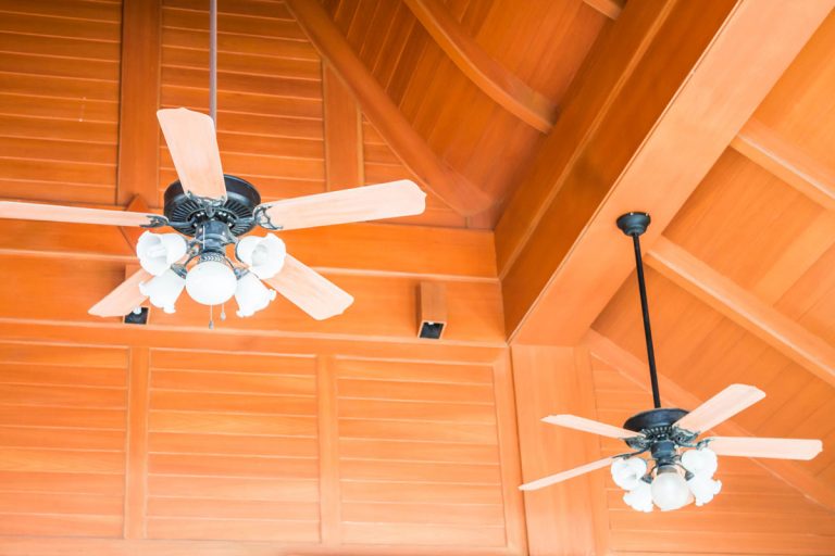 Old style wood ceiling fans with white glass lamps, Are Ceiling Fans a Fire Hazard?