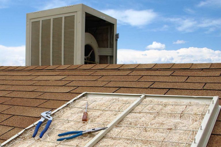 A swamp cooler maintenance on reddish shingled roof, Can You Run An Evaporative Cooler All Day?