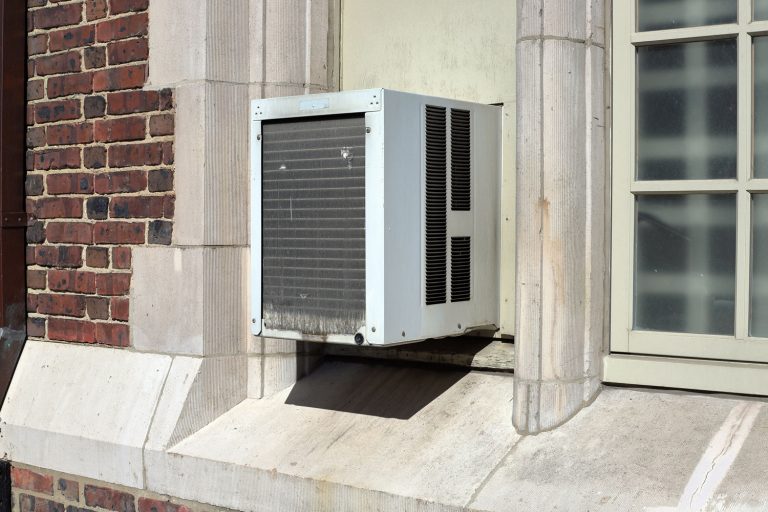 A window air conditioning unit outside an apartment building, Does A Window Air Conditioner Pull Air From Outside?