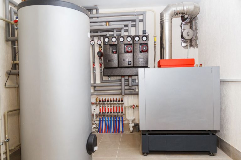 A household boiler under the basement of a living room, How Long Does It Take To Clean An Oil Furnace?