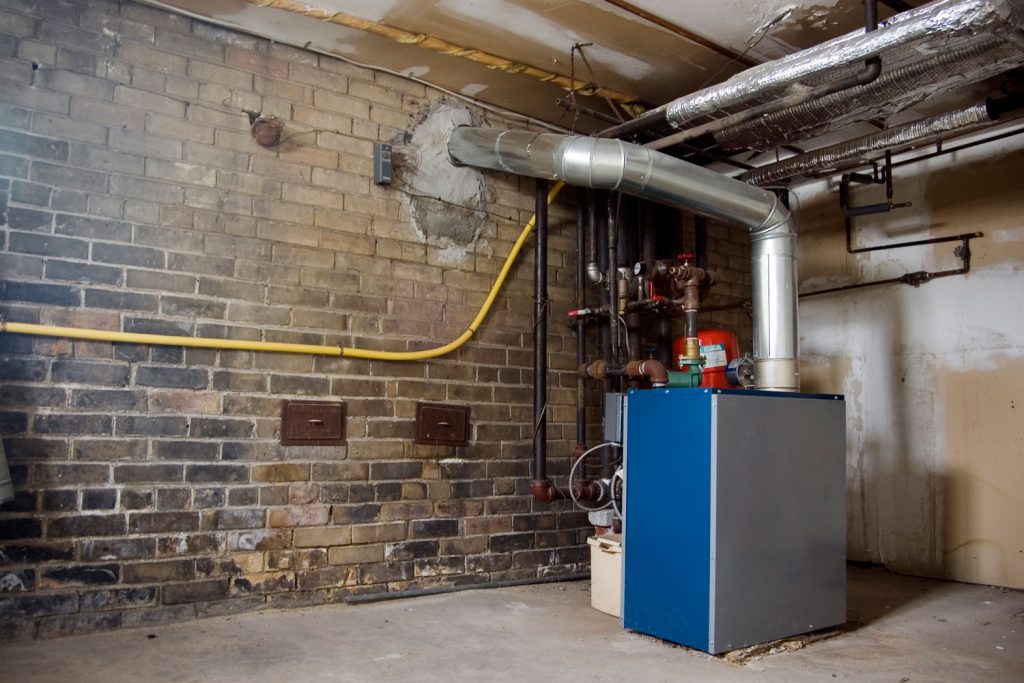 A furnace located under the basement