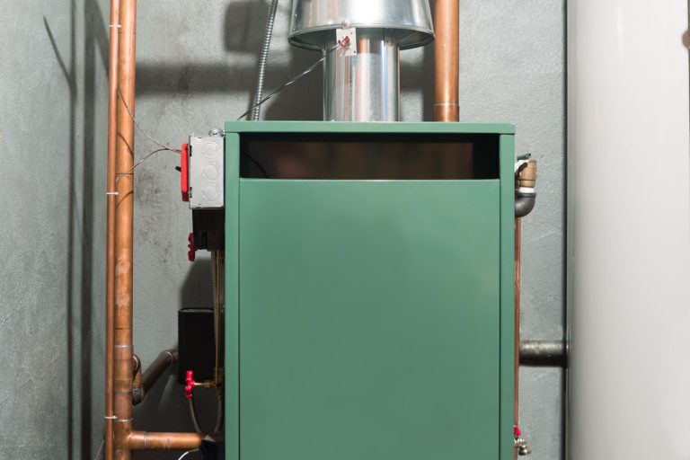 A green painted furnace in the basement, How To Find Goodman Furnace Model And Serial Number 