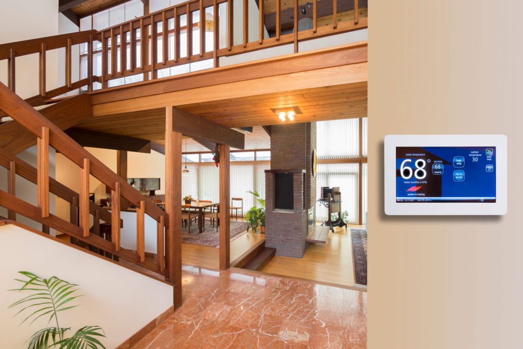 A thermostat set to 68 degrees in the living room area