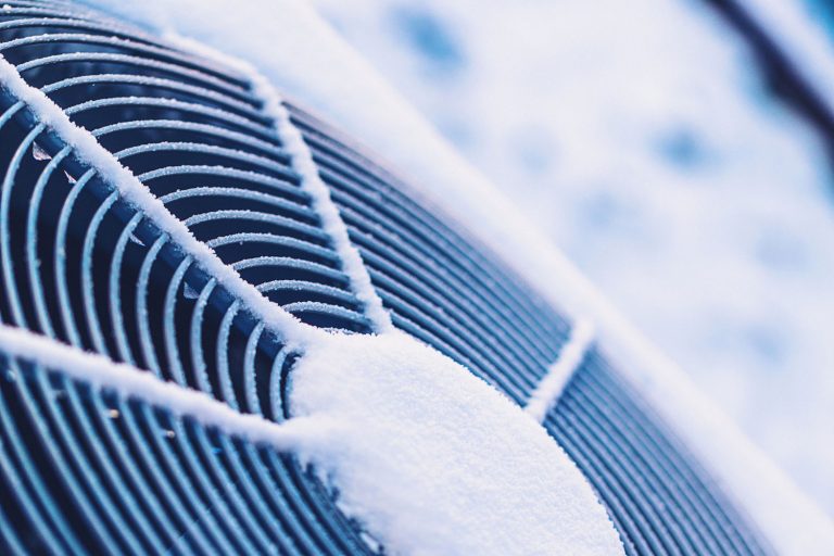 Air conditioning unit covered in snow, Can A Central Air Unit Freeze Up?