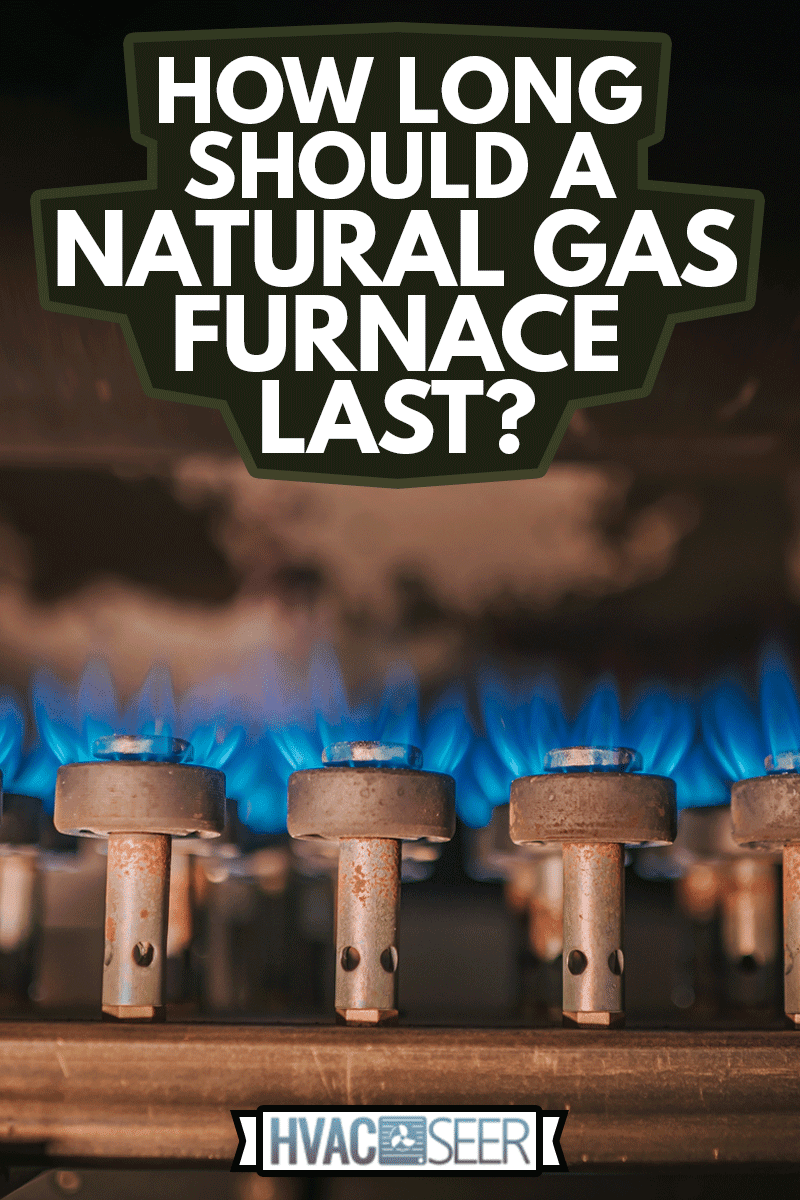 Fire on gas furnace with dark background, How Long Should A Natural Gas Furnace Last? 