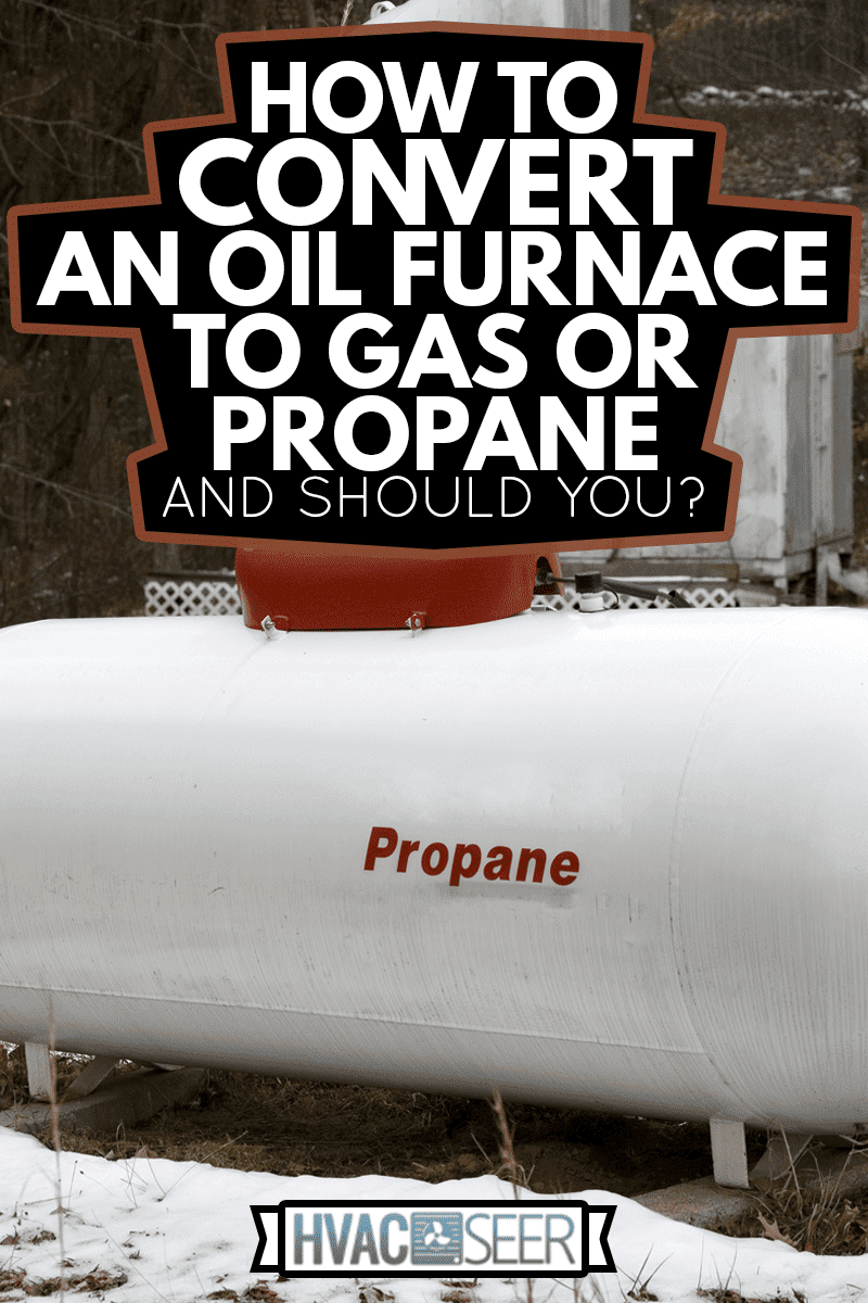 propantank uden for bopæl i snedækket vinter, hvordan man konverterer en oliefyr til Gas eller propan—og skal du?