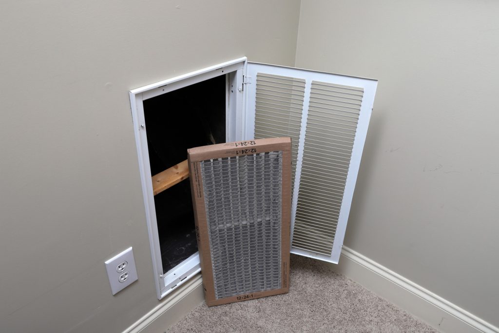 Removing Dirty Air filter for home central air conditioning system