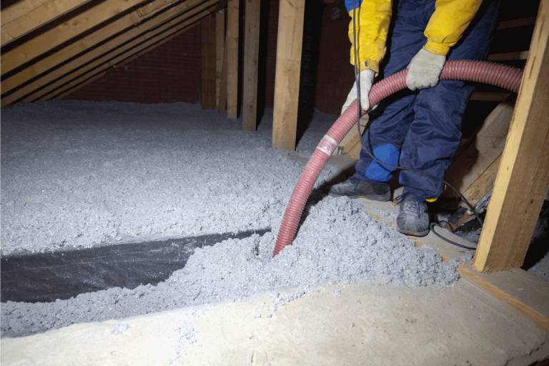 Spraying-cellulose-insulation-in-the-attic-of-a-house.-Insulation-of-the-attic-or-floor-in-the-house.-Does-Cellulose-Insulation-Make-You-Itch