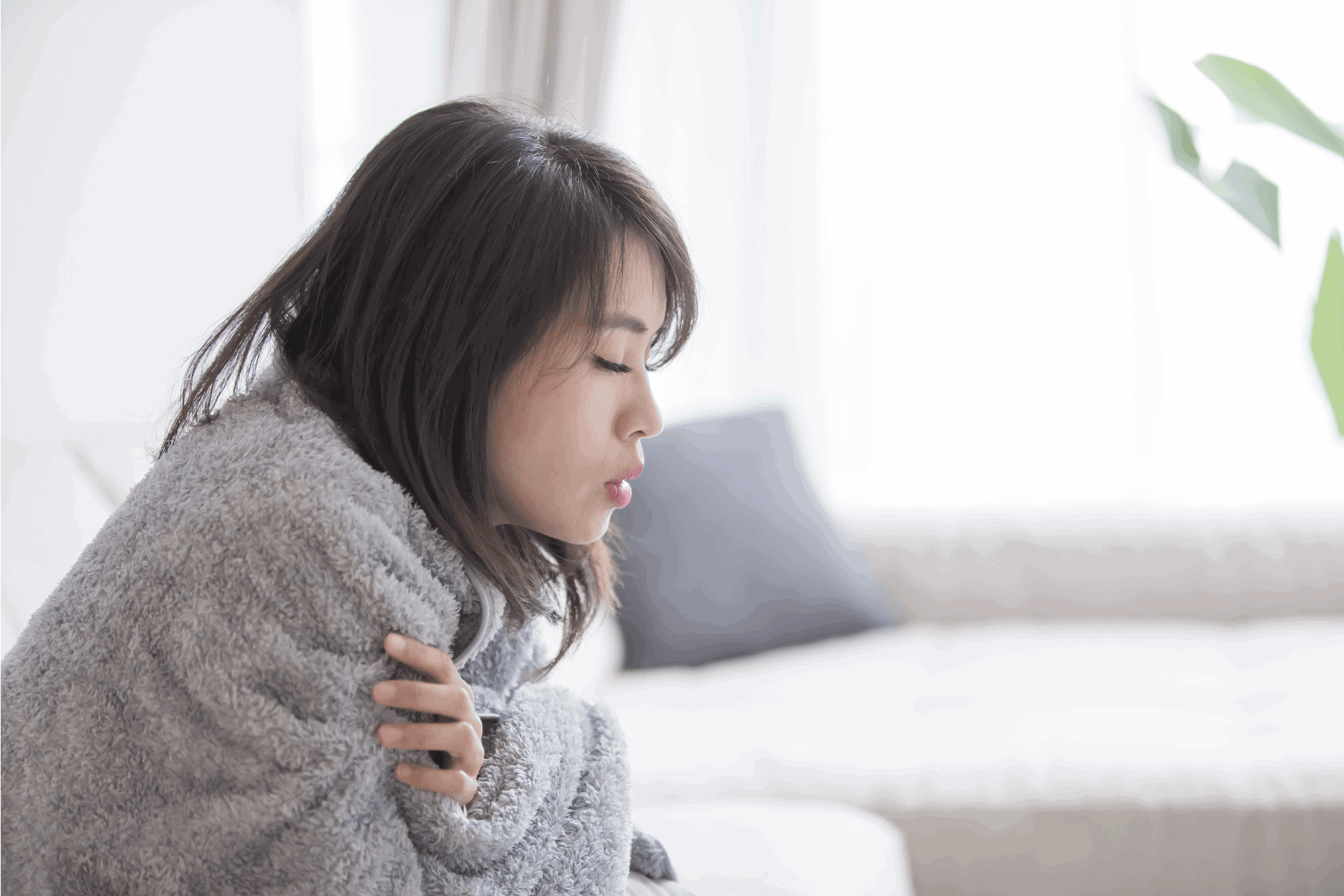 woman sick and feel cold at home