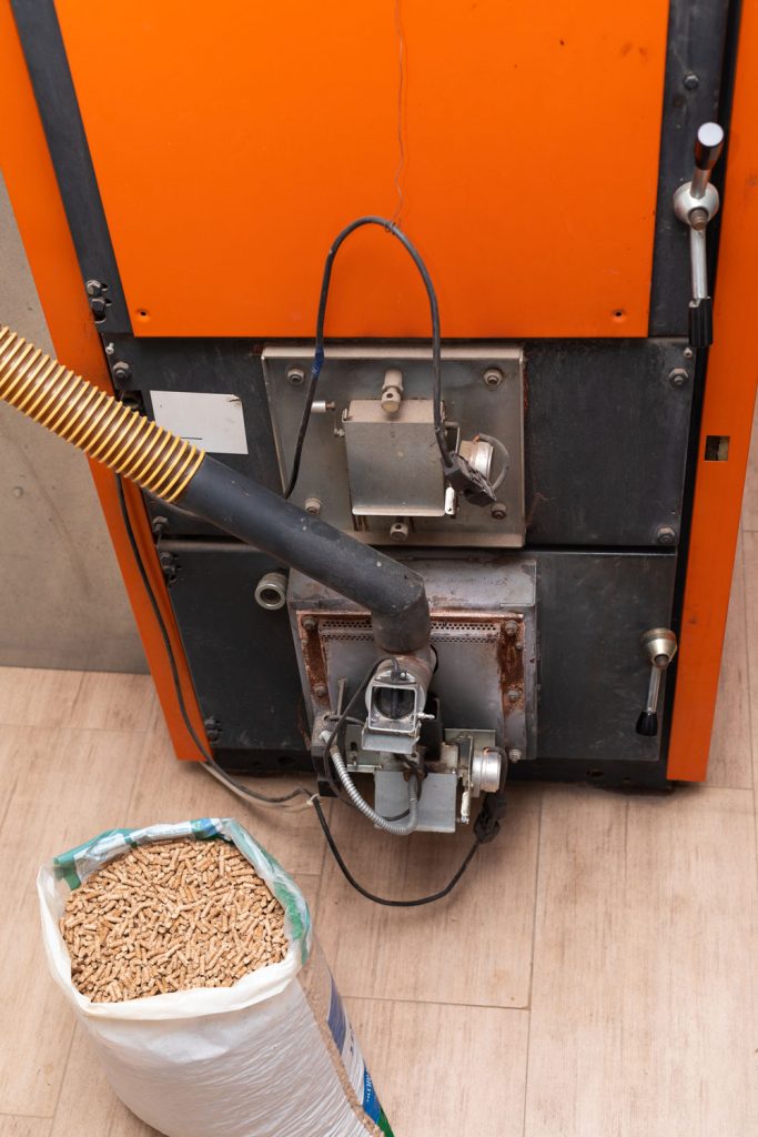 A central heating system dispensing wooden pellets