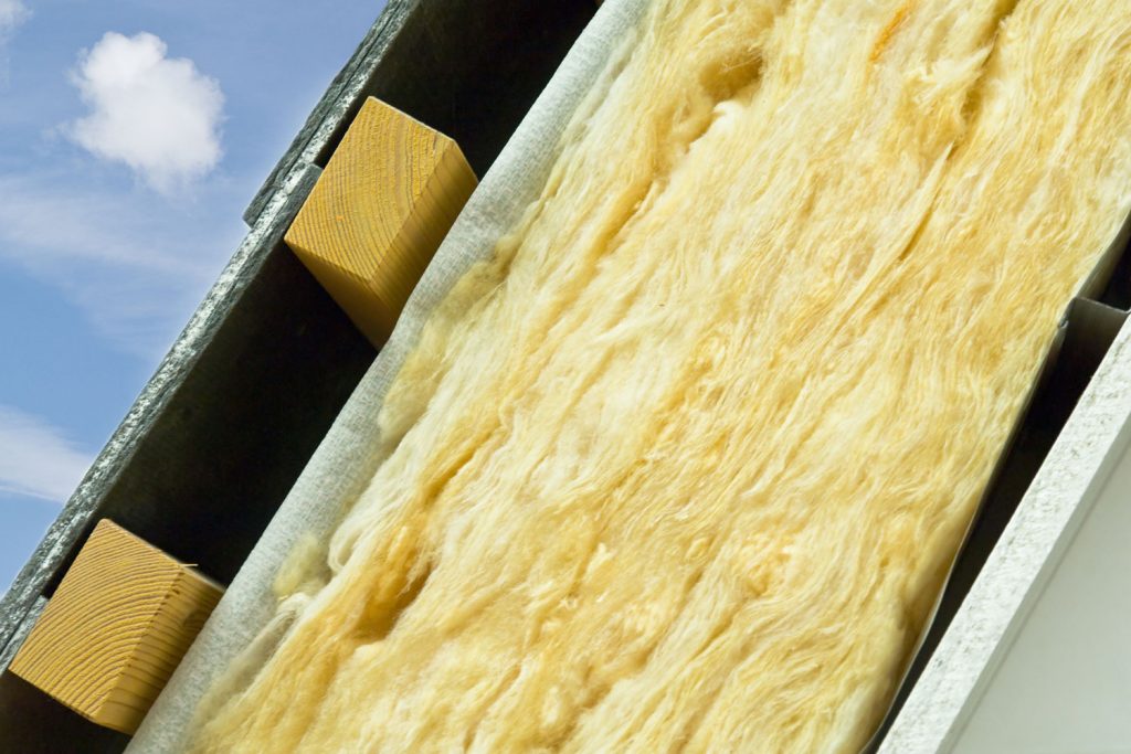A detailed photo of thermal insulation installed in the ceiling