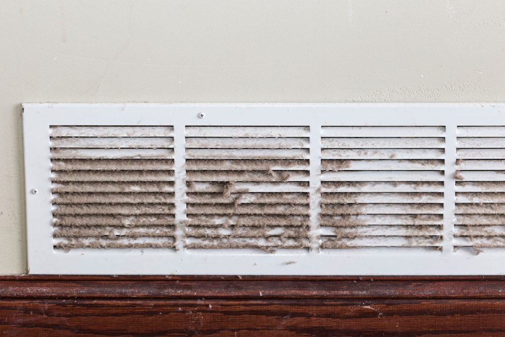 Dirt accumulating in the dirty air ducts of a house