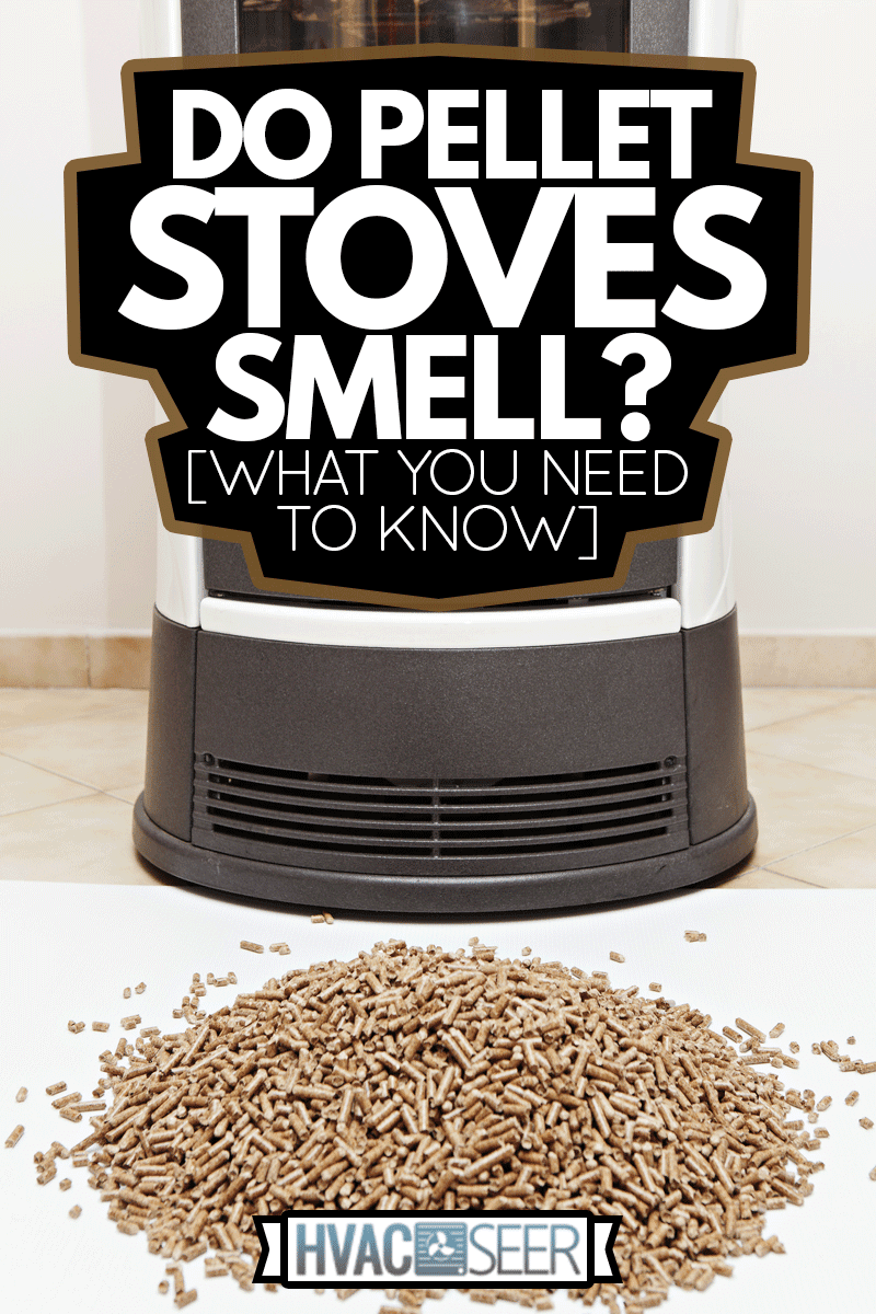Pellet stove in white painted wall, Do Pellet Stoves Smell? [What You Need To Know]