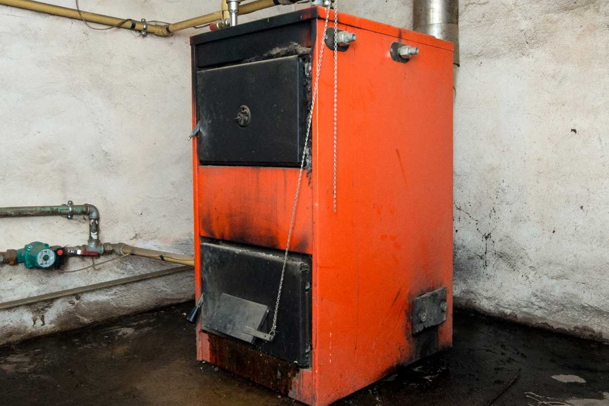 Old furnace in basement room