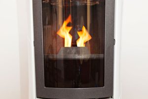 Read more about the article Do Pellet Stoves Smell? [What You Need To Know]