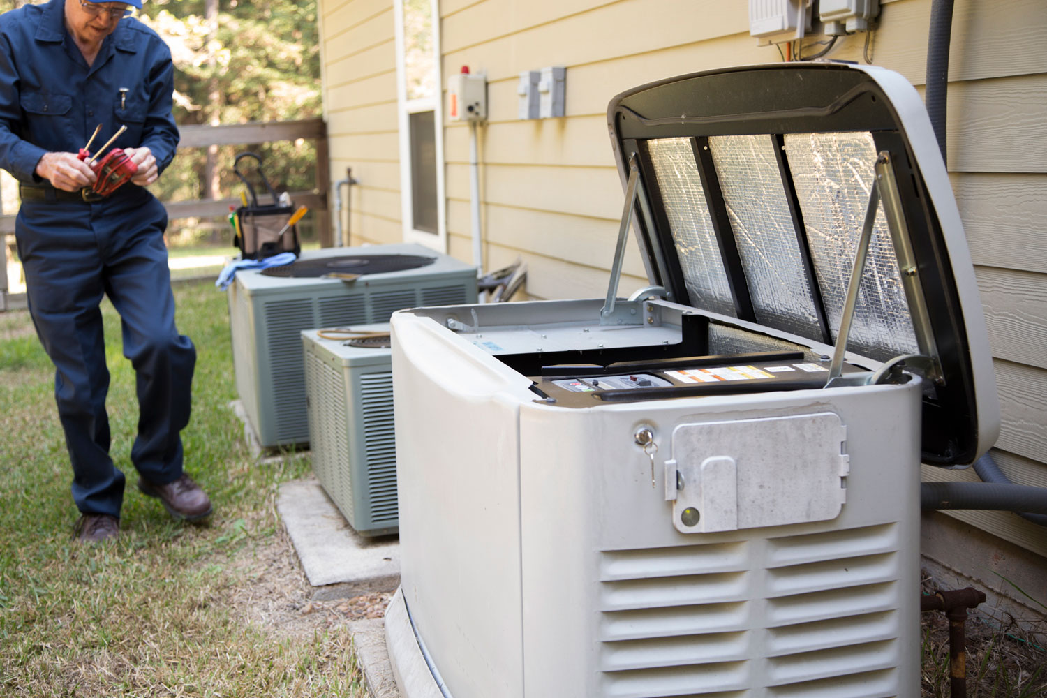 Senior Adult air conditioner Technician/Electrician services outdoor AC unit and the Gas Generator, Can A Generator Run An Electric Furnace?
