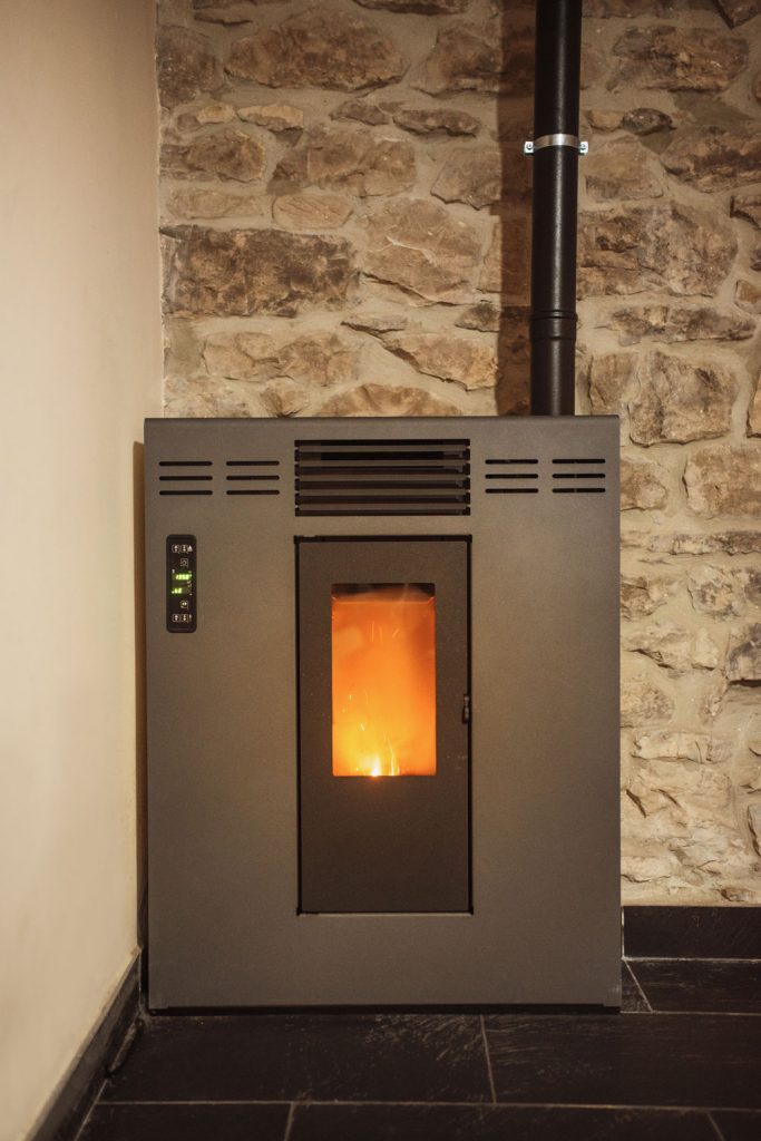 A huge pellet stove under the basement of a house