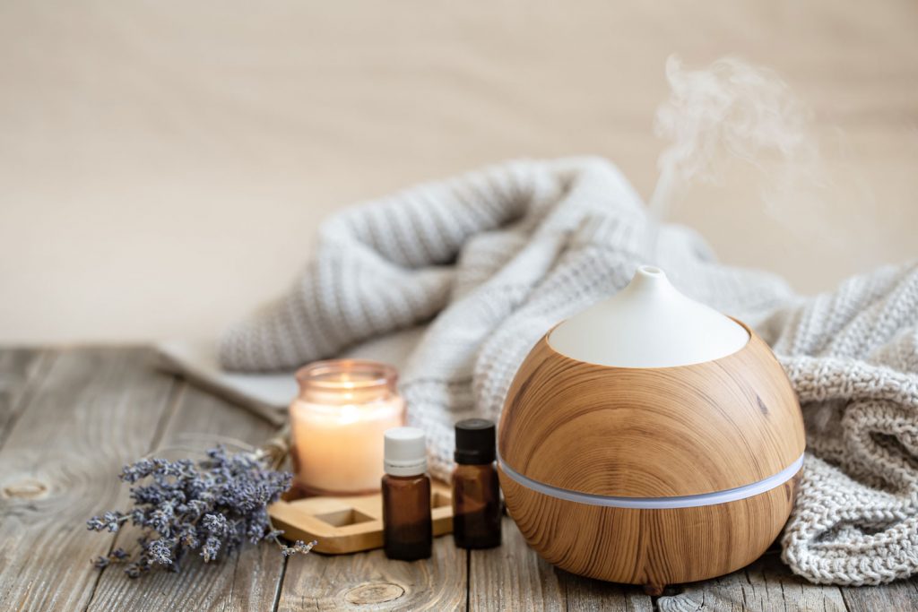 A wooden covered humidifier placed on the table
