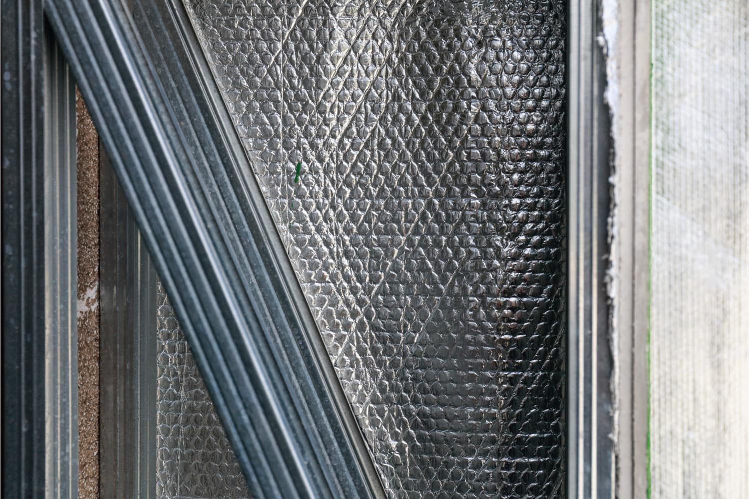 Close up of silver foil insulation or reflector sheet texture