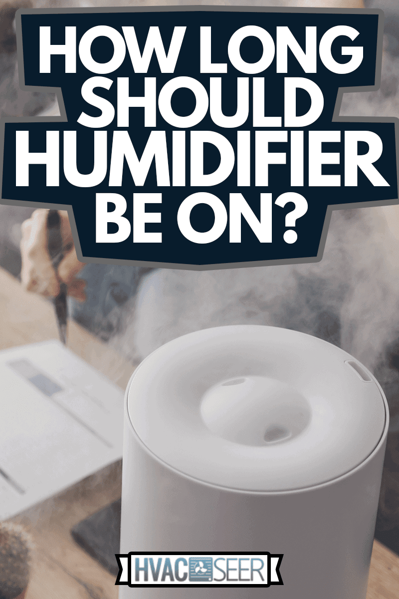 Woman freelancer uses a household humidifier in the workplace to maintain relative humidity and microclimate in the workplace of the home office with a laptop and documents, How Long Should Humidifier Be On?