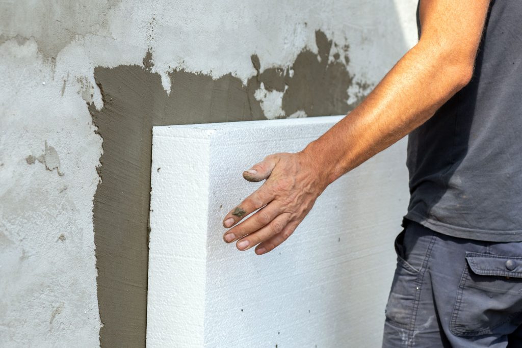 Insulation of facade wall with styrofoam sheets