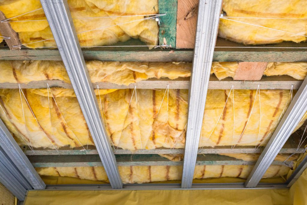 Mineral wool installed in the attic reinforced with metal studs