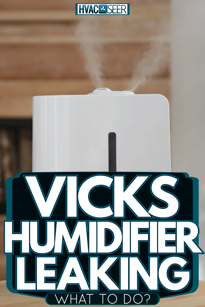 A white humidifier turned on in the living room, Vicks Humidifier Leaking—What To Do?
