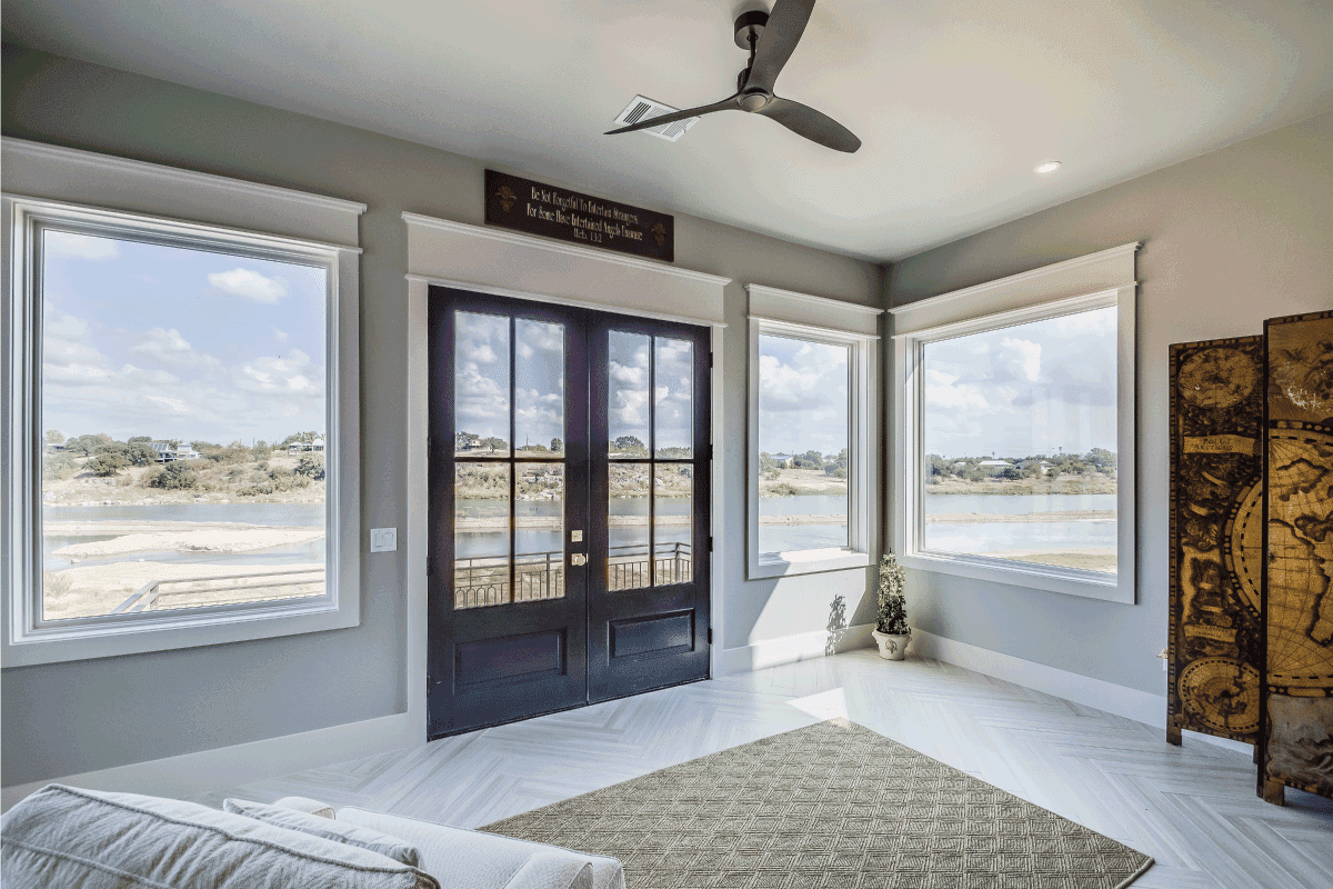 White flooring and large glass windows for spectacular view. How To Insulate French Doors