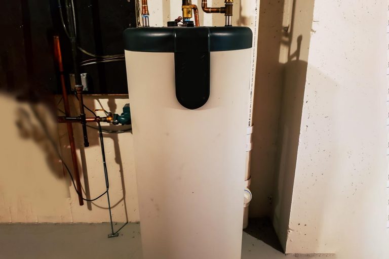 A 40 gallon smart high efficiency water heater storage tank in the basement of a residential home, How Long Should A 40-Gallon Water Heater Stay Hot?