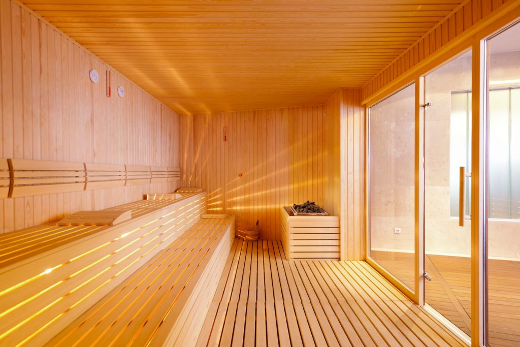 A glass walled sauna room