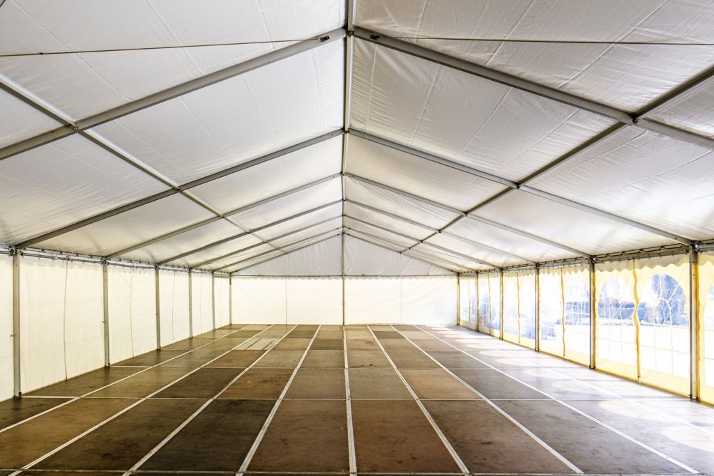 A wide and huge tent photographed inside