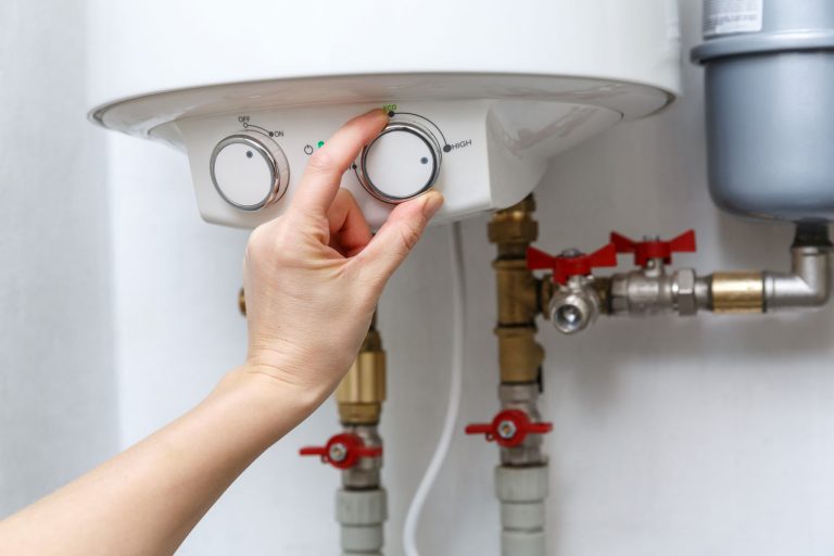 Adjusting the water heater in the basement, Does A Gas Hot Water Heater Need Electricity?