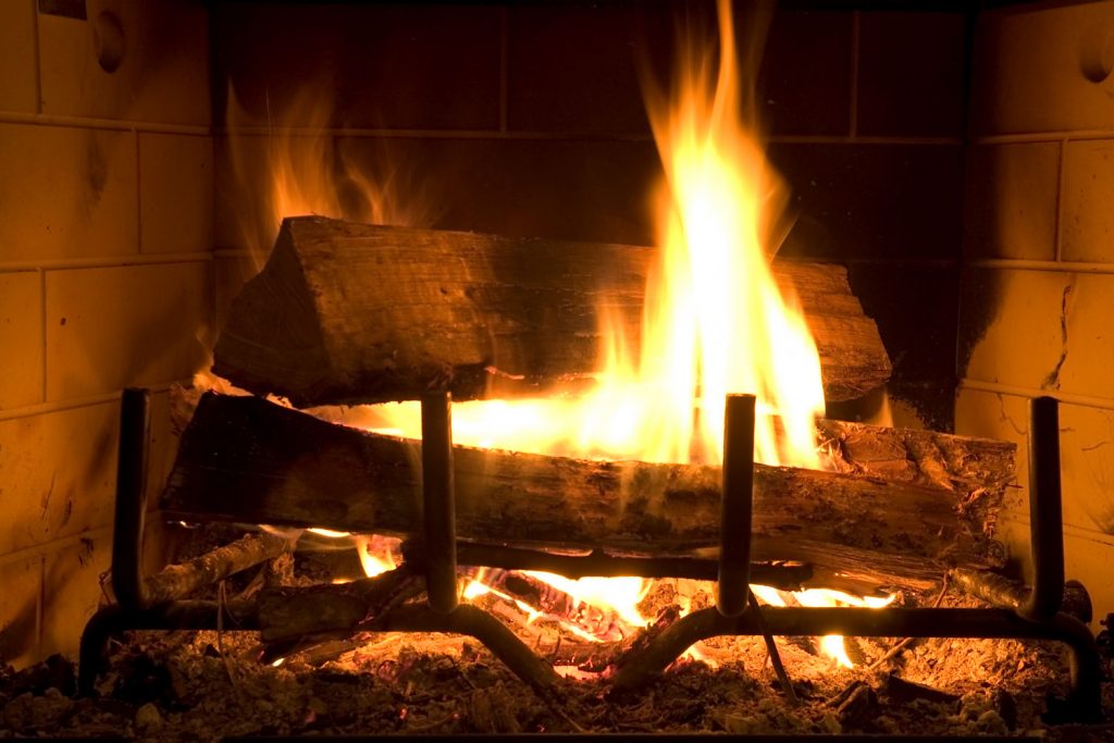 Firewood burning in the fireplace