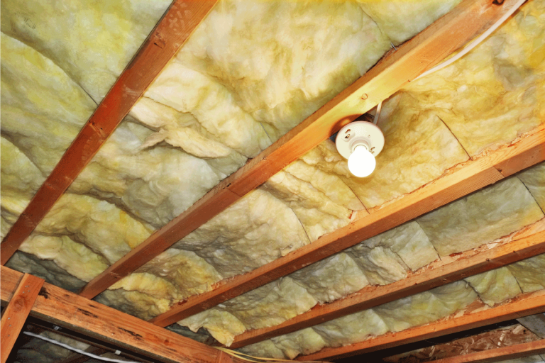 Glass-wool-insulation-under-typical-American-house.-How-Long-Does-Fiberglass-Insulation-Last
