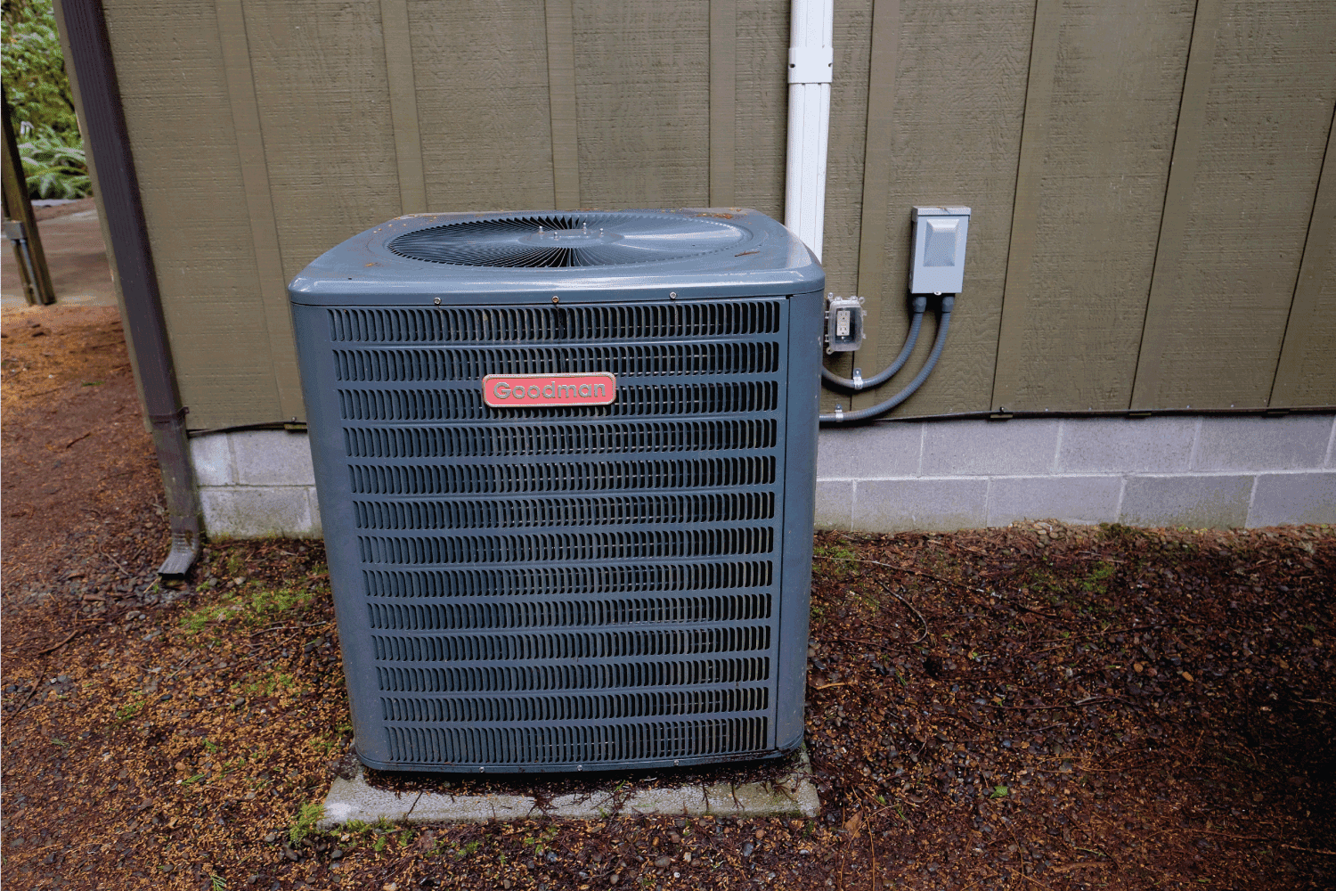 Goodman HVAC unit on the outside of a vacation house.