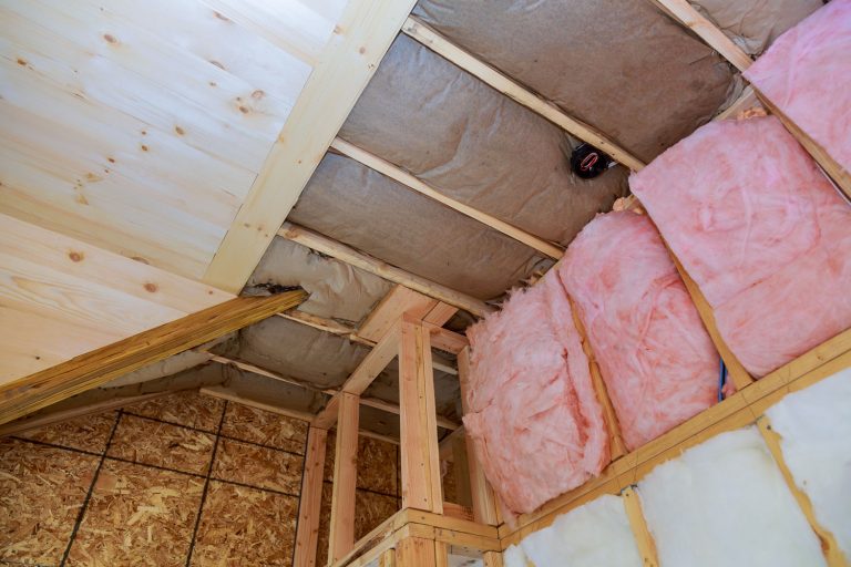 Huge blocks of fiberglass insulation installed in the walls, R13 Insulation: Use, Thickness, Cost, And More