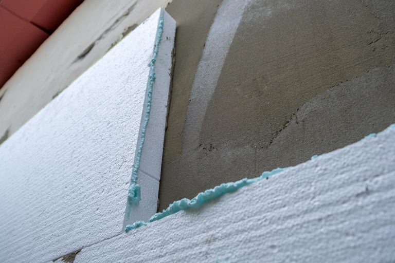 Installation of a styrofoam insulation sheets on house facade wall for thermal protection, How To Insulate The Kitchen Walls