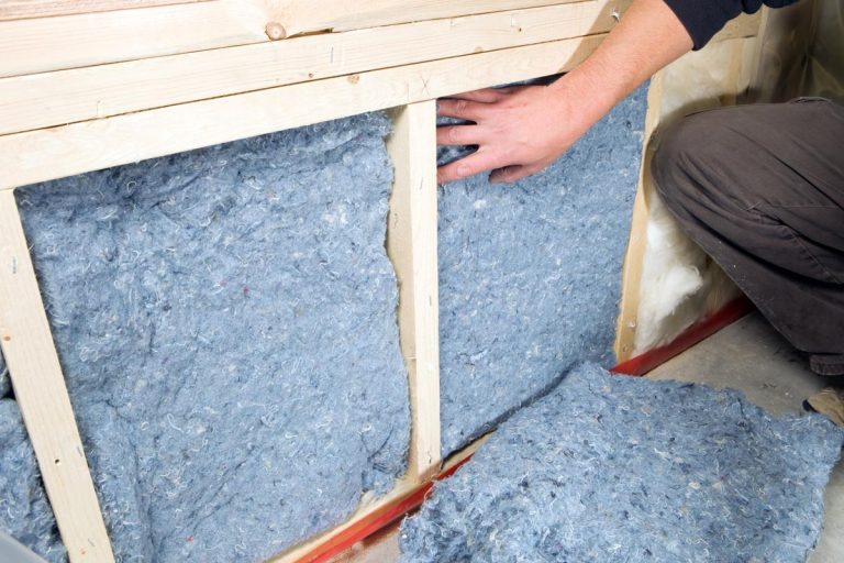 Installing recycled blue jean denim insulation in wall frame, How To Recycle Denim Insulation