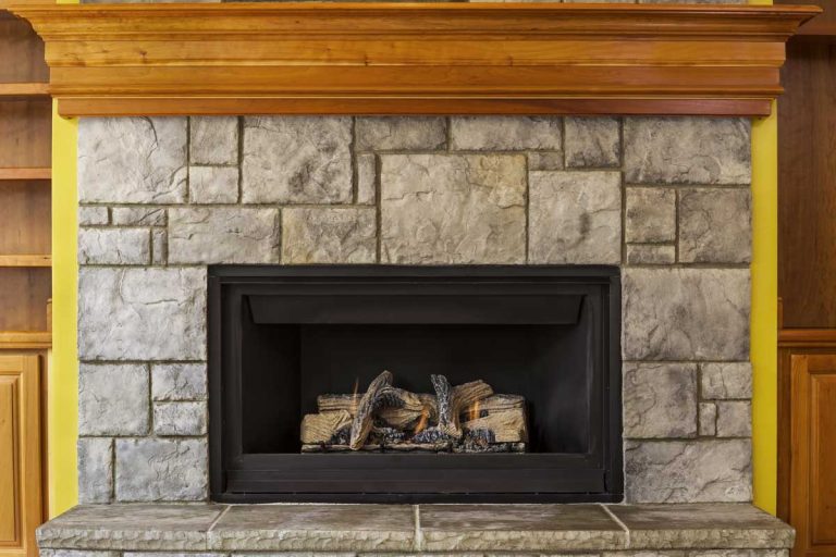 Natural Gas Insert Fireplace built with stone and wood, How Long Do Fireplace Inserts Last?
