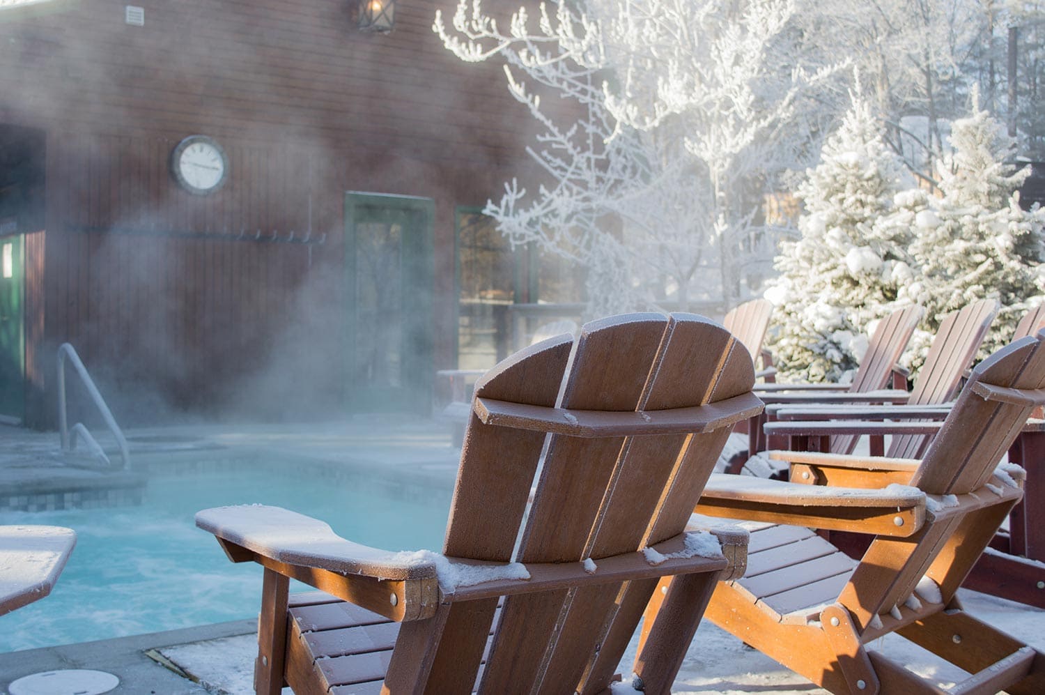 Picture of frosted chairs around a hot pool in a spa resort