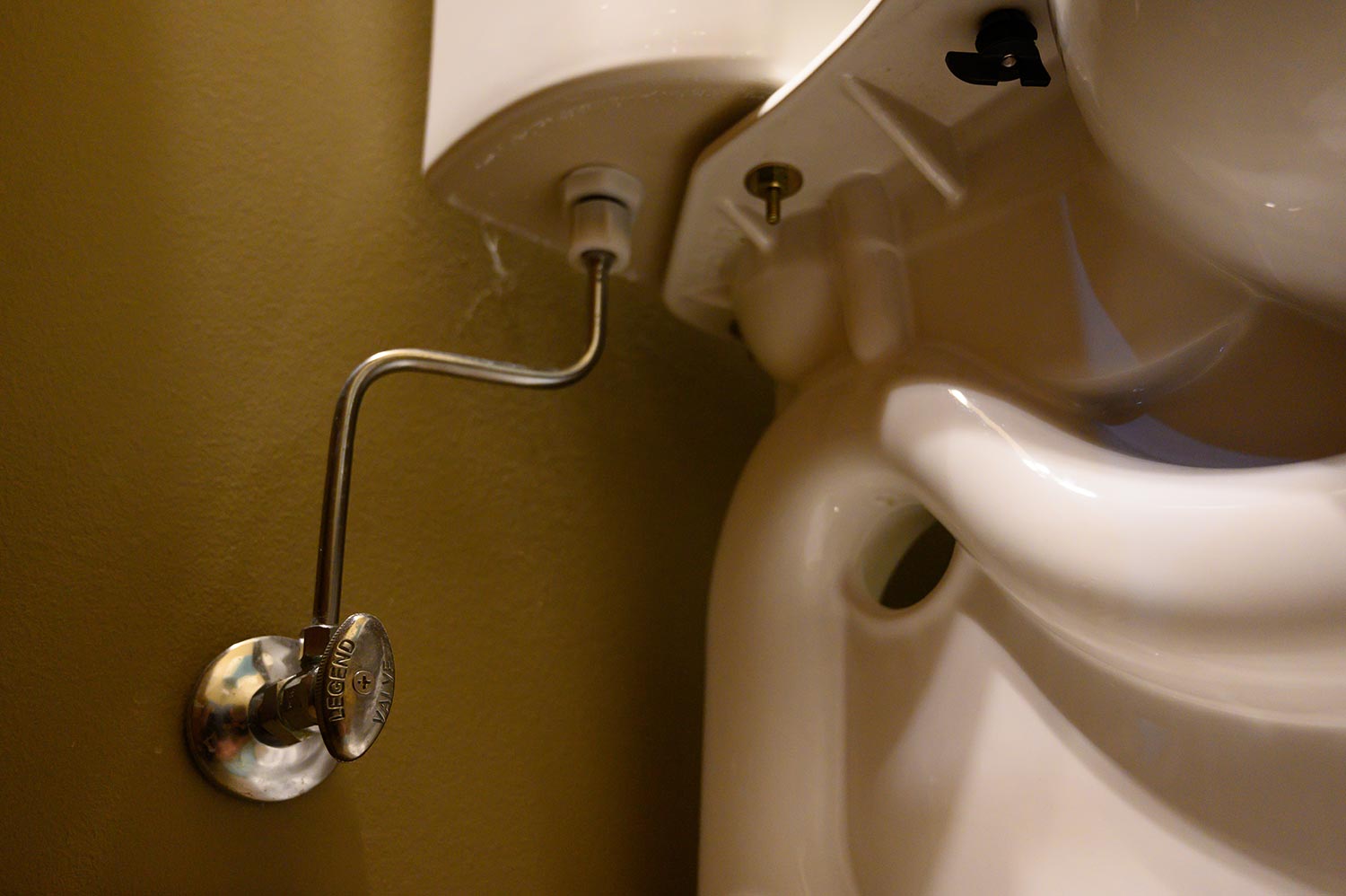 Residential toilet water shutoff valve