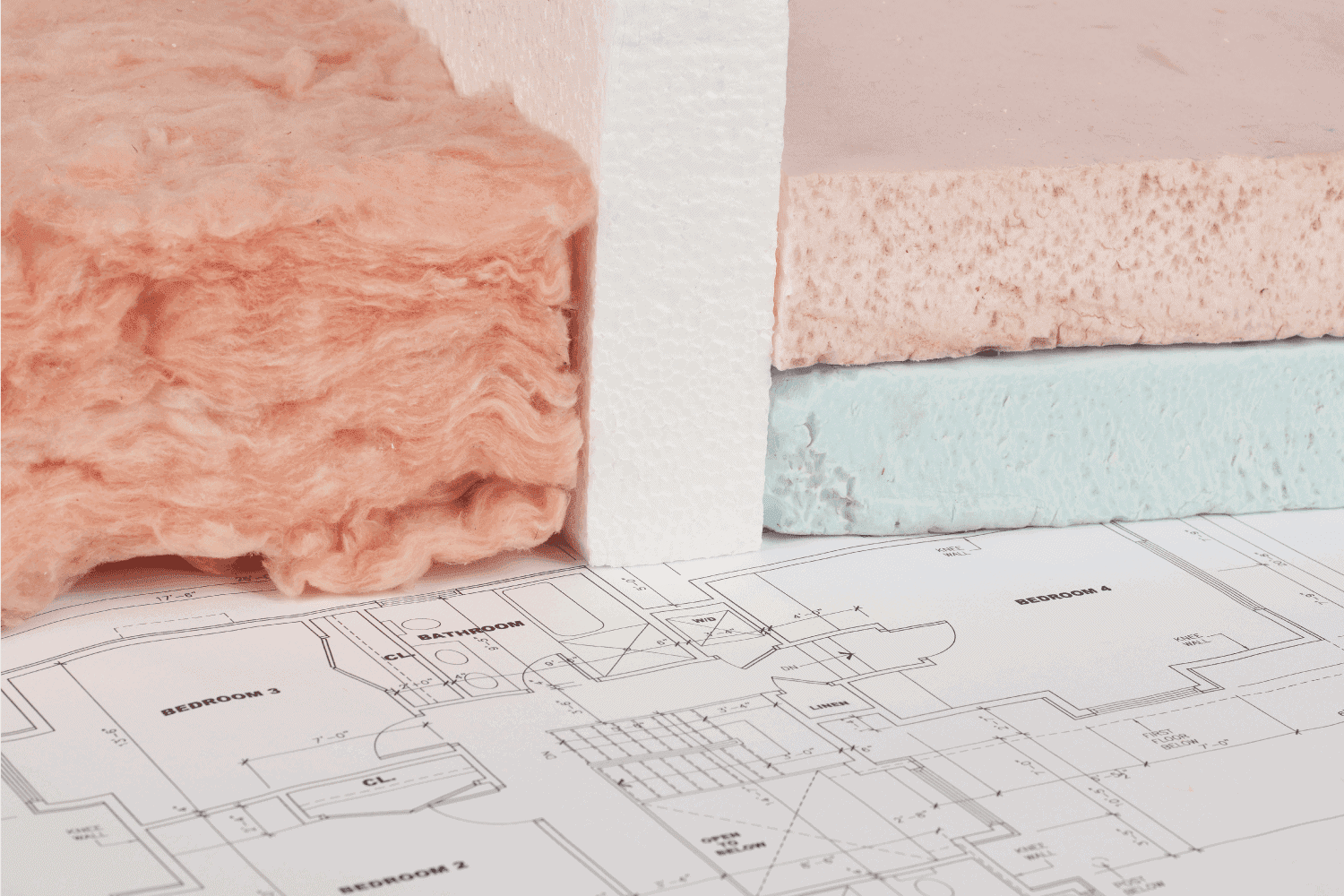 house renovation blueprint with samples of thermal insulation