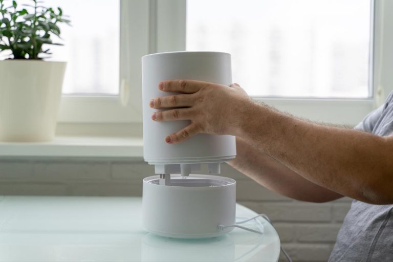 Man uses a humidifier at home, No Mist Coming From Dyson Humidifier—What Could Be Wrong?