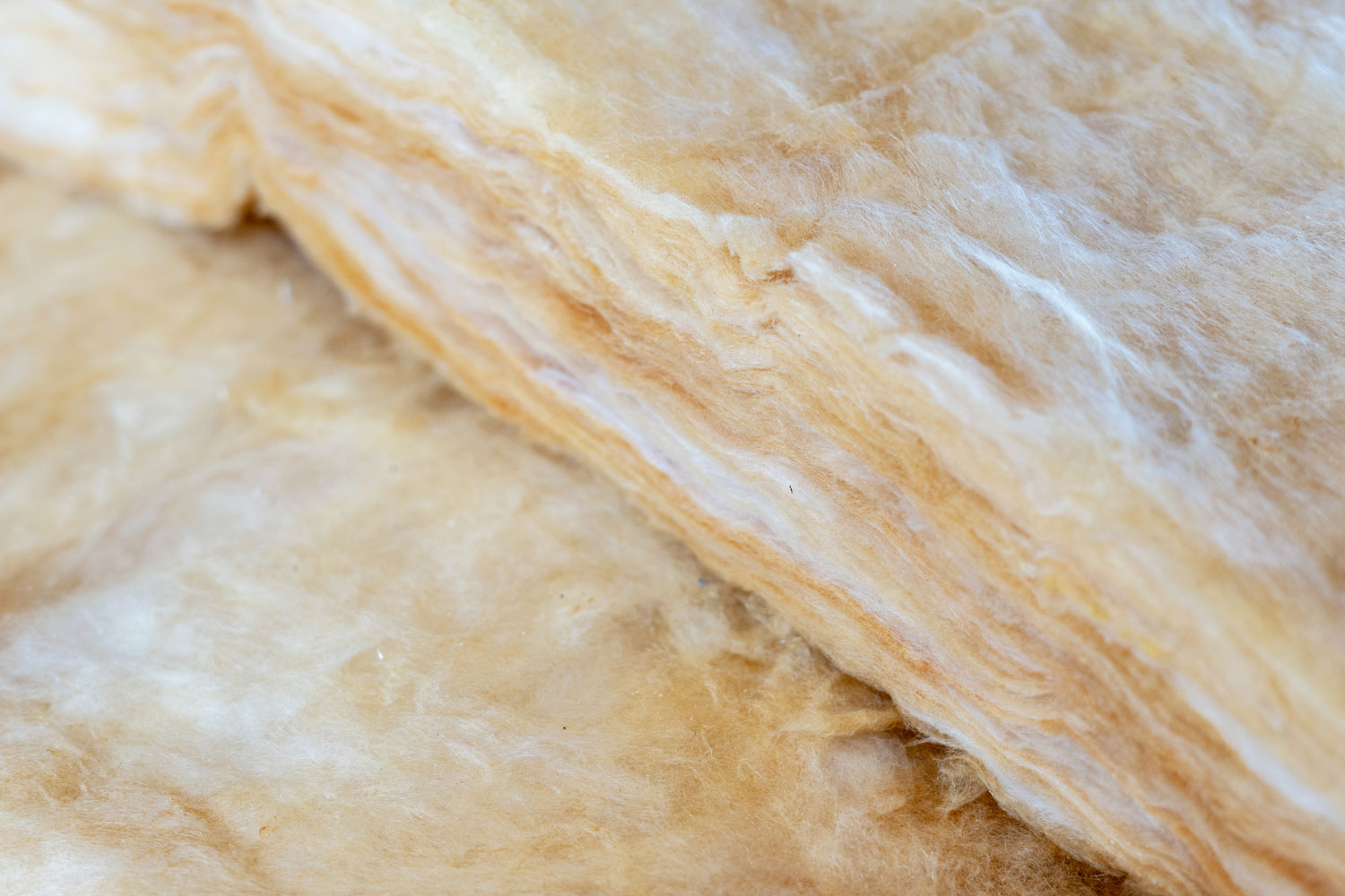 A thick sheet of batt insulation