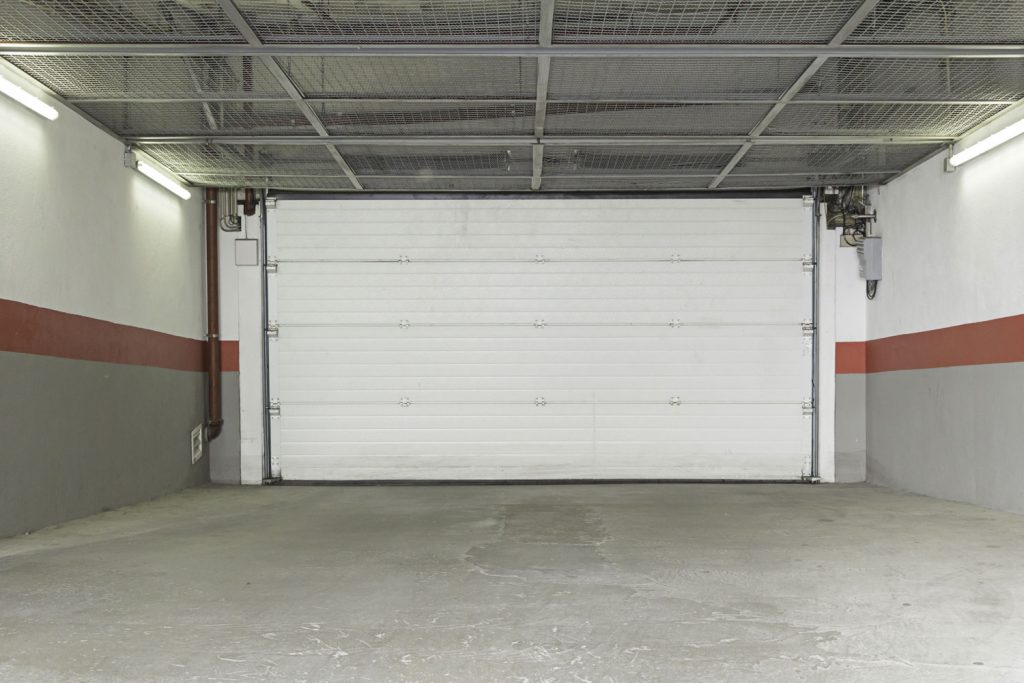 A white garage door for a two cargo garage