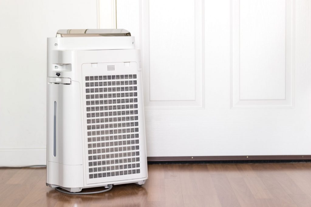 A white portable air conditioning unit