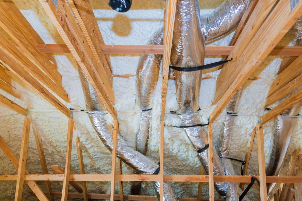 Ductings and loose fill insulation at the attic